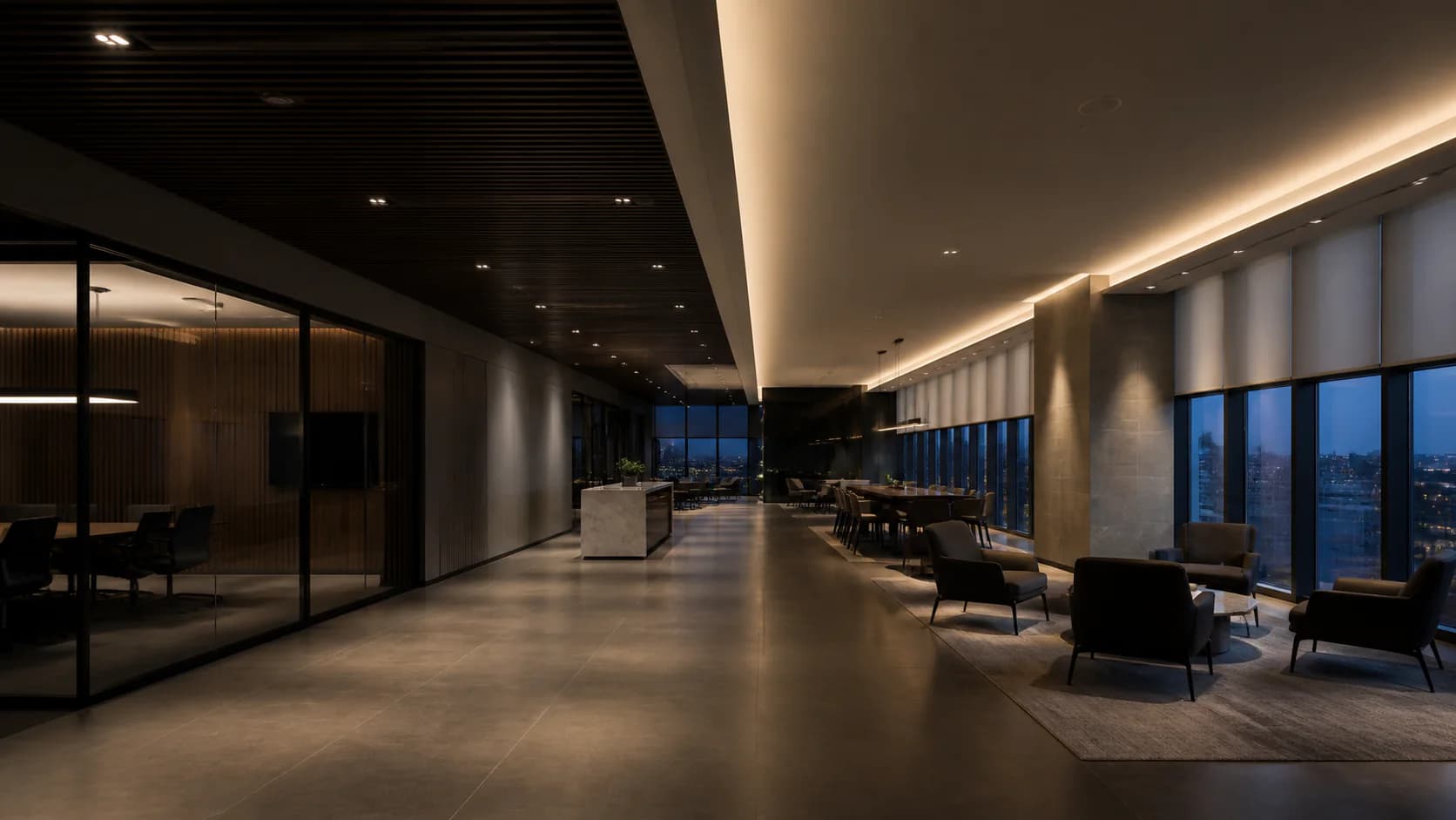 Commercial workplace with integrated ceiling lighting and shared spaces at dusk